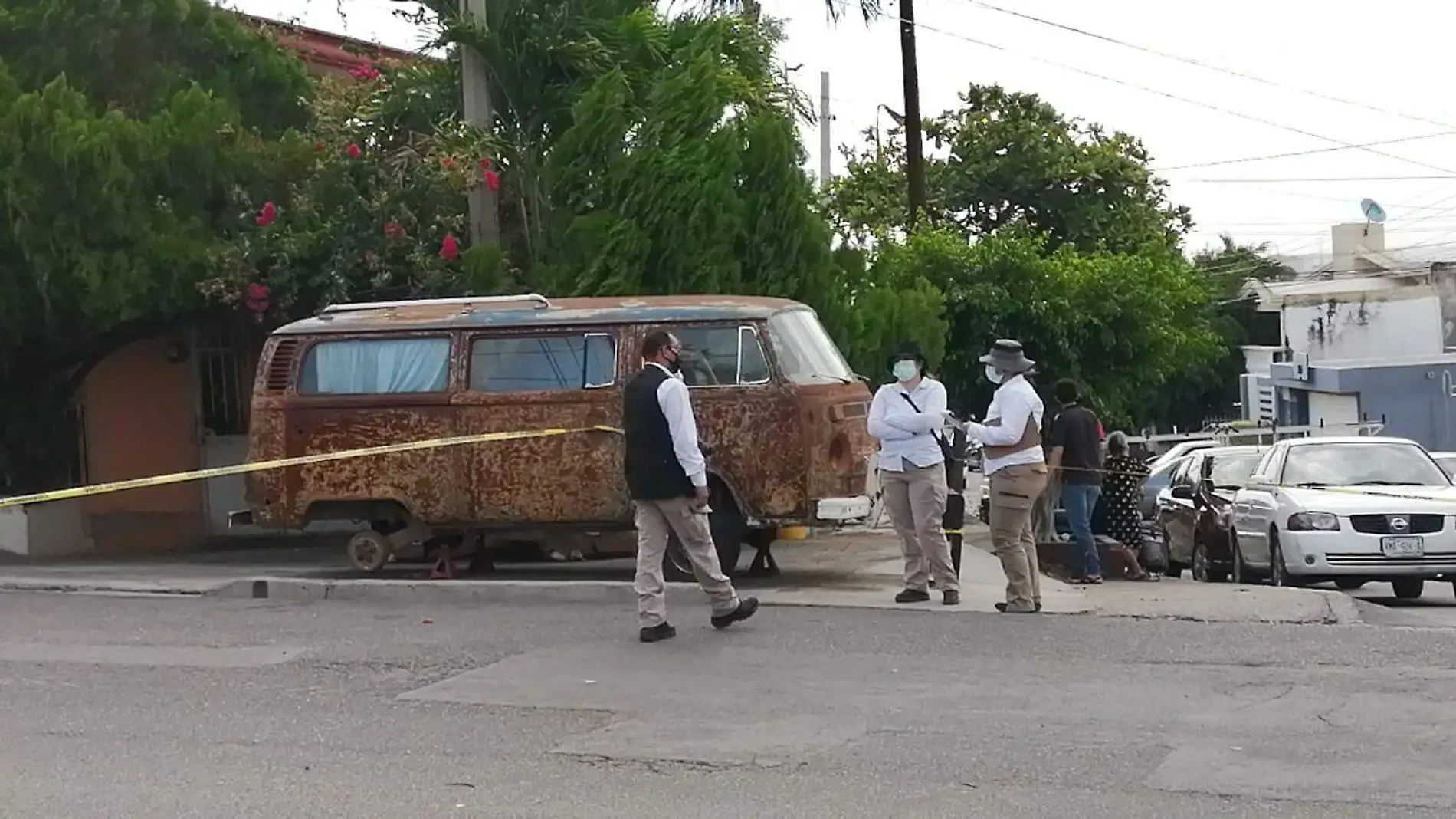 Matan a tiros a carrocero y balean a dos hombres1